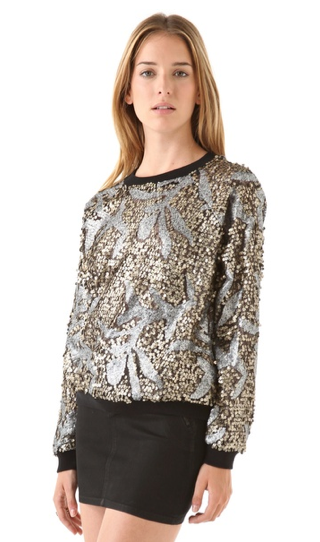 There's something totally vintage-y (like, maybe you found this at the back of your cool grandma's closet) about this April, May Noa sweatshirt ($257). The antiqued paillettes and metallic sequins punch up this casual topper tenfold, and we have to say, it's an eye-catching choice.
There's something totally vintage-y (like, maybe you found this at the back of your cool grandma's closet) about this April, May Noa sweatshirt ($257). The antiqued paillettes and metallic sequins punch up this casual topper tenfold, and we have to say, it's an eye-catching choice.