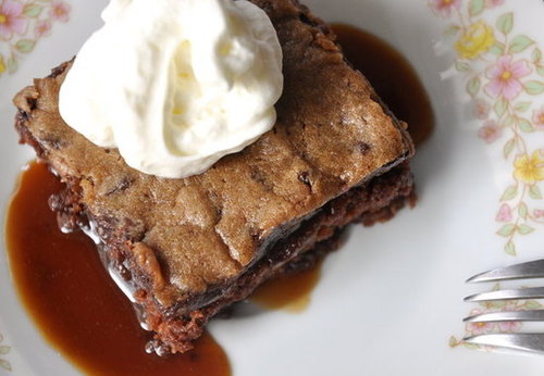 Chocolate Chunk Cookie and Brownie Cake, with Caramel Sauce and Whipped Cream