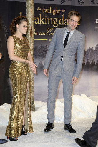 Kristen Gets Glam in Gold Alongside Taylor and Rob Kristen Gets Glam in Gold Alongside Taylor and Rob