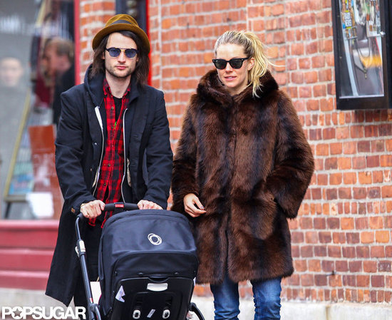 Sienna Miller and Tom Sturridge walked with daughter Marlowe.
Sienna Miller and Tom Sturridge walked with daughter Marlowe.
