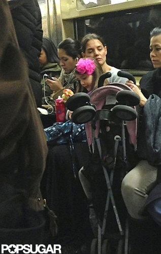 Katie Holmes Gives Suri Cruise a Kiss on the Subway Katie Holmes Gives Suri Cruise a Kiss on the Subway