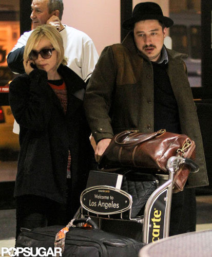 Carey Mulligan and husband Marcus Mumford touched down at LAX.
Carey Mulligan and husband Marcus Mumford touched down at LAX.