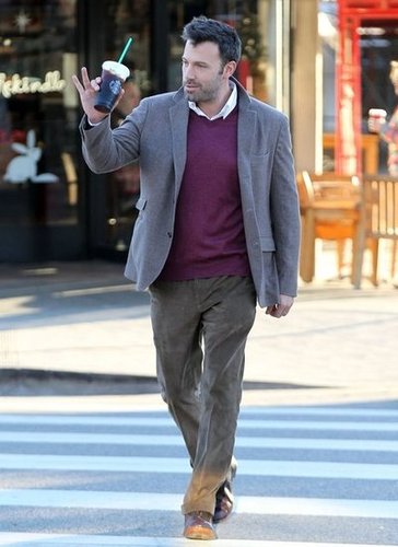 Ben Affleck waved to a fan as he crossed the street.
Ben Affleck waved to a fan as he crossed the street.