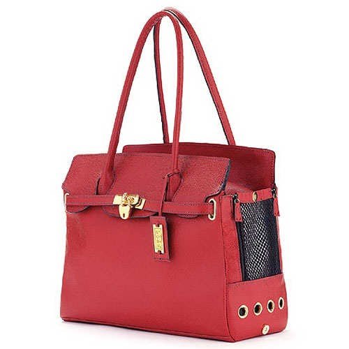 For the pet owner with a closet full of Birkins, there's no better choice than this Charles Nantucket Pet Carrier ($425) to carry your pet in style.
For the pet owner with a closet full of Birkins, there's no better choice than this Charles Nantucket Pet Carrier ($425) to carry your pet in style.