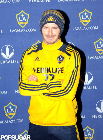 David Beckham posed for photos in an LA Galaxy shirt. David Beckham posed for photos in an LA Galaxy shirt.