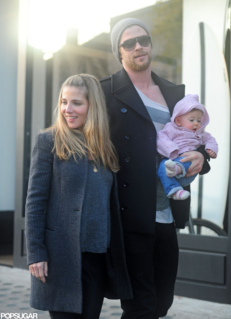Chris Hemsworth carried his daughter, India, during a walk with Elsa Pataky. Chris Hemsworth carried his daughter, India, during a walk with Elsa Pataky.