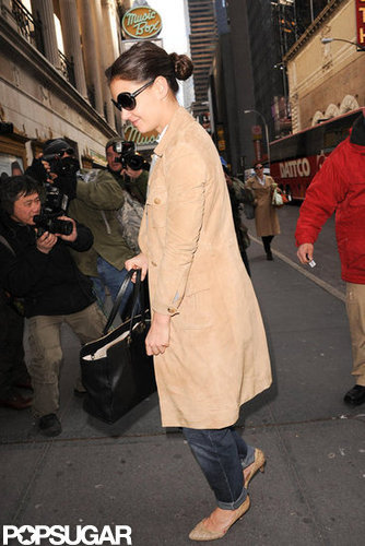 Katie Holmes kept warm in a camel-colored trench.
Katie Holmes kept warm in a camel-colored trench.