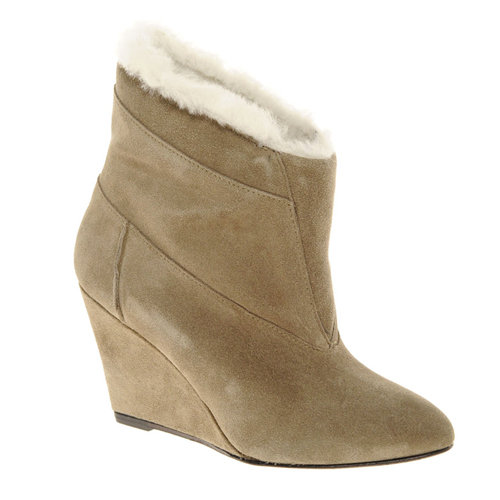 Stay cozy all season long in these IRO Faux Shearling Lined Ankle Boots ($362, originally $802).
Stay cozy all season long in these IRO Faux Shearling Lined Ankle Boots ($362, originally $802).