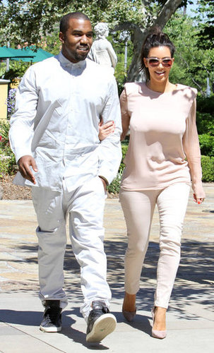 Kim Kardashian held onto Kanye West during an LA day out in June 2012.
Kim Kardashian held onto Kanye West during an LA day out in June 2012.