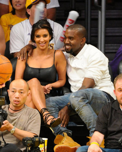 Kanye West had his arm around Kim Kardashian and a smile on his face at a May 2012 Lakers game in LA.
Kanye West had his arm around Kim Kardashian and a smile on his face at a May 2012 Lakers game in LA.