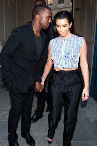 Kanye West whispered in Kim Kardashian's ear while they visited Paris in July 2012.
Kanye West whispered in Kim Kardashian's ear while they visited Paris in July 2012.