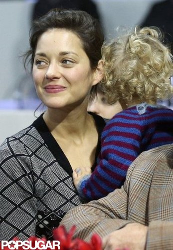 Marion Cotillard held her son, Marcel Canet, on her lap at the Paris Masters.
Marion Cotillard held her son, Marcel Canet, on her lap at the Paris Masters.