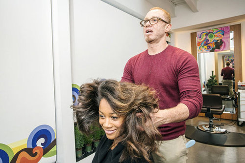 To create the first look, comb out the curls with your fingers. You can apply a finishing serum, like Hair Rules Finishing Cream ($18) to your hands to keep pouffiness at bay.
To create the first look, comb out the curls with your fingers. You can apply a finishing serum, like Hair Rules Finishing Cream ($18) to your hands to keep pouffiness at bay.