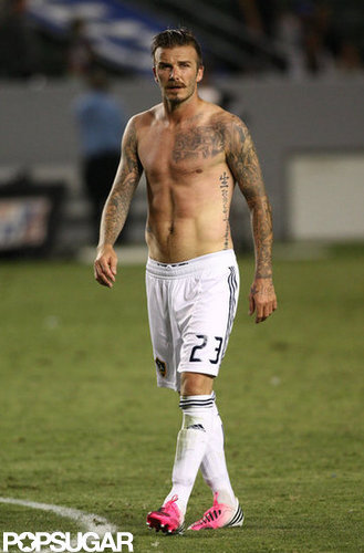 David Beckham lost his shirt after a soccer match with the LA Galaxy in Carson, CA, this July.
David Beckham lost his shirt after a soccer match with the LA Galaxy in Carson, CA, this July.