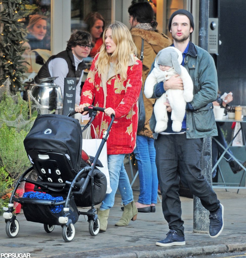 Sienna Miller and Tom Sturridge walked around London with daughter Marlowe Sturridge. Sienna Miller and Tom Sturridge walked around London with daughter Marlowe Sturridge.