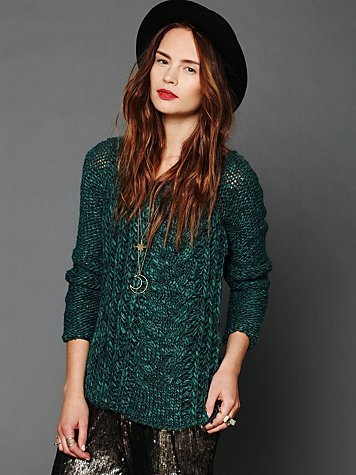 Pair Free People's emerald-green chunky cable pullover ($70, originally $148) with dark red trousers for a superchic take on holiday dressing.
Pair Free People's emerald-green chunky cable pullover ($70, originally $148) with dark red trousers for a superchic take on holiday dressing.