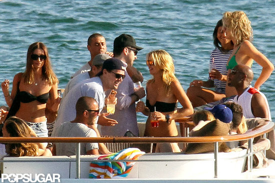 Leonardo DiCaprio joked around with a bikini-clad female.
Leonardo DiCaprio joked around with a bikini-clad female.