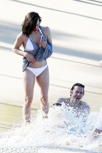 Bikini-Clad Milla Jovovich Poses Beachside With Her Family on NYE Bikini-Clad Milla Jovovich Poses Beachside With Her Family on NYE