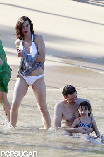 Bikini-Clad Milla Jovovich Poses Beachside With Her Family on NYE Bikini-Clad Milla Jovovich Poses Beachside With Her Family on NYE