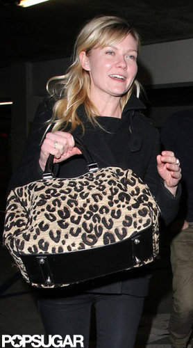 Kirsten Dunst carried a leopard bag.
Kirsten Dunst carried a leopard bag.