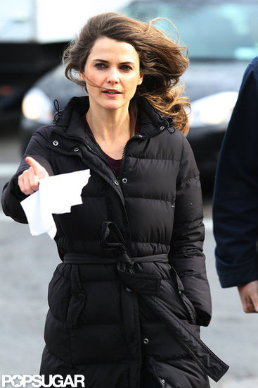Keri Russell stepped onto set in a black jacket.
Keri Russell stepped onto set in a black jacket.