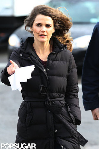 Keri Russell stepped onto set in a black jacket.
Keri Russell stepped onto set in a black jacket.