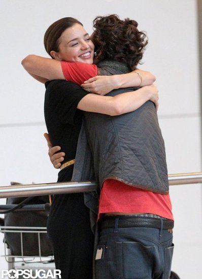Orlando Bloom hugged Miranda Kerr upon arriving at London's Heathrow Airport in July 2010.
Orlando Bloom hugged Miranda Kerr upon arriving at London's Heathrow Airport in July 2010.