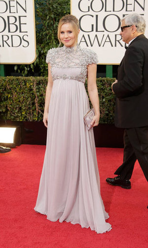 An expectant Kristen Bell highlighted her growing bump in a lavender Jenny Packham gown with an embellished top.
An expectant Kristen Bell highlighted her growing bump in a lavender Jenny Packham gown with an embellished top.
