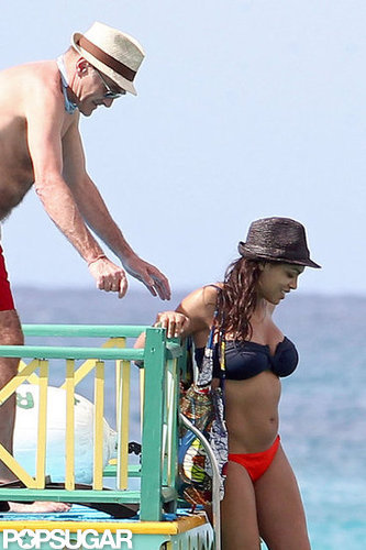 Rosario Dawson wore a brown hat.
Rosario Dawson wore a brown hat.