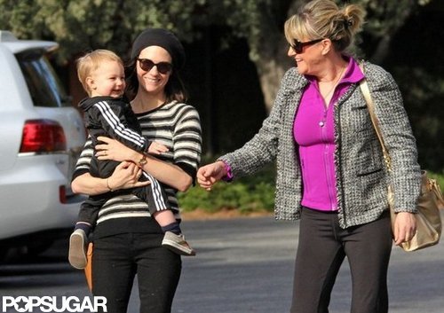 January Jones carried Xander for a stroll in LA with her mom, Karen.
January Jones carried Xander for a stroll in LA with her mom, Karen.