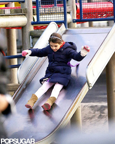 Suri went down a slide.
Suri went down a slide.