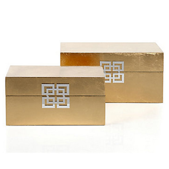 These metallic gold boxes ($60 for two) are a great, stylish alternative to standard storage.
These metallic gold boxes ($60 for two) are a great, stylish alternative to standard storage.