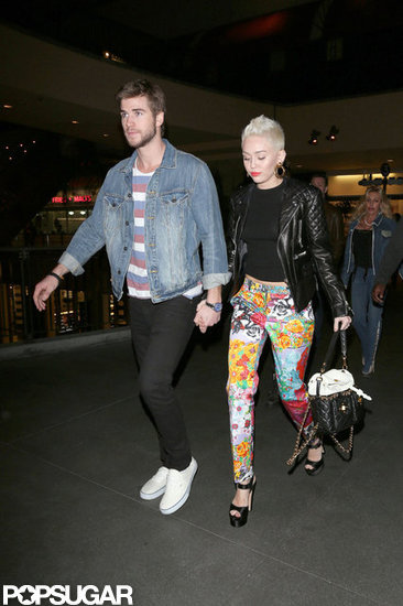Miley Cyrus and Liam Hemsworth walked to dinner in LA.
Miley Cyrus and Liam Hemsworth walked to dinner in LA.