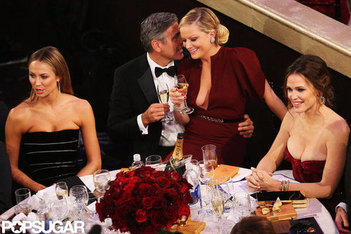Amy Poehler sat on George Clooney's lap during the show.
Amy Poehler sat on George Clooney's lap during the show.