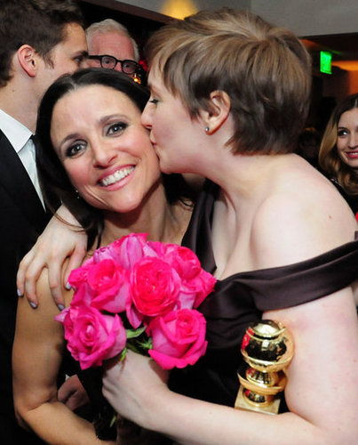 Lena Dunham kissed her fellow Golden Globe Award nominee Julia Louis-Dreyfus at HBO's Globes afterparty.
Lena Dunham kissed her fellow Golden Globe Award nominee Julia Louis-Dreyfus at HBO's Globes afterparty.