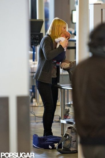 Claire Danes held baby Cyrus Dancy close as she went through security at LAX.
Claire Danes held baby Cyrus Dancy close as she went through security at LAX.