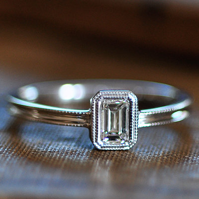 A sleek, classic emerald-cut ring like this Nora Kogan Sarah ring ($3,475) belongs on the finger of a sophisticated styler.
A sleek, classic emerald-cut ring like this Nora Kogan Sarah ring ($3,475) belongs on the finger of a sophisticated styler.