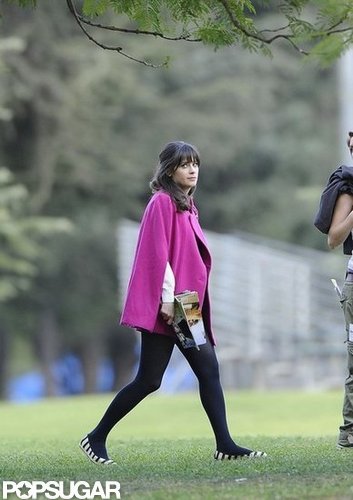 Zooey Deschanel Gets Sporty in Stripes on the Set of New Girl Zooey Deschanel Gets Sporty in Stripes on the Set of New Girl
