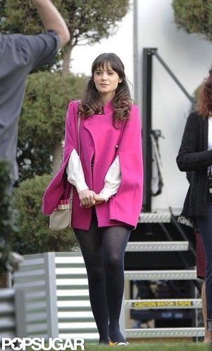 Zooey Deschanel had her hair pulled back.
Zooey Deschanel had her hair pulled back.