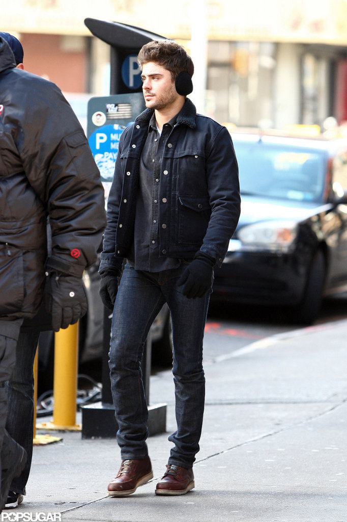 Zac Efron filmed while wearing earmuffs in NYC.
Zac Efron filmed while wearing earmuffs in NYC.