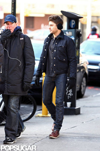 Zac Efron hit the NYC streets wearing earmuffs.
Zac Efron hit the NYC streets wearing earmuffs.