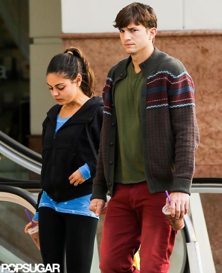 Mila Kunis and Ashton Kutcher headed out of a Coffee Bean in LA together.
Mila Kunis and Ashton Kutcher headed out of a Coffee Bean in LA together.
