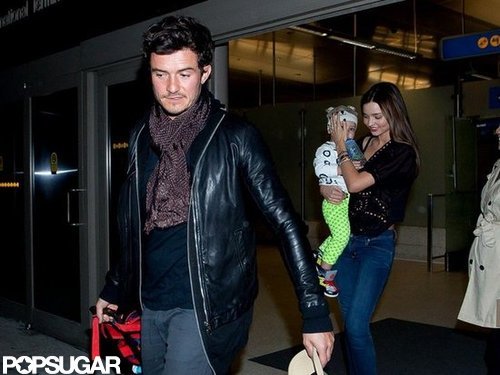 Miranda Kerr arrived at LAX with son Flynn Bloom and husband Orlando Bloom.
Miranda Kerr arrived at LAX with son Flynn Bloom and husband Orlando Bloom.