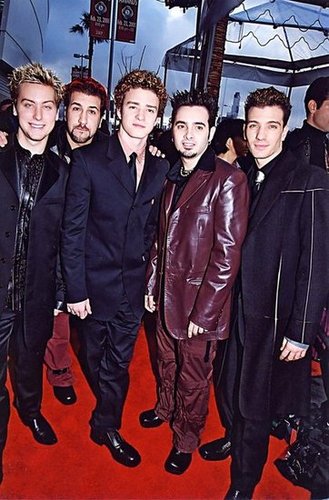 Sigh — the good old days. Justin hit the red carpet with his *NSYNC bandmates in 2000, marking what would be the kickoff for lots of suit-and-tie moments to come.
Sigh — the good old days. Justin hit the red carpet with his *NSYNC bandmates in 2000, marking what would be the kickoff for lots of suit-and-tie moments to come.