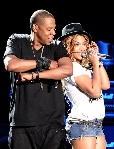 Beyoncé and Jay Z shared back-to-back smiles while performing together at Coachella Valley Music and Arts Festival in April 2010.
Beyoncé and Jay Z shared back-to-back smiles while performing together at Coachella Valley Music and Arts Festival in April 2010.