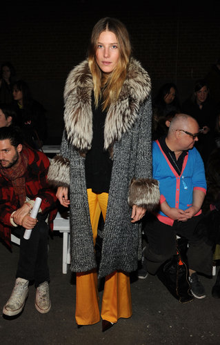 Styling a fur-trim cardigan coat with flared orange trousers at the Creatures of the Wind show, Dree Hemingway took a page straight from the '70s.
Styling a fur-trim cardigan coat with flared orange trousers at the Creatures of the Wind show, Dree Hemingway took a page straight from the '70s.