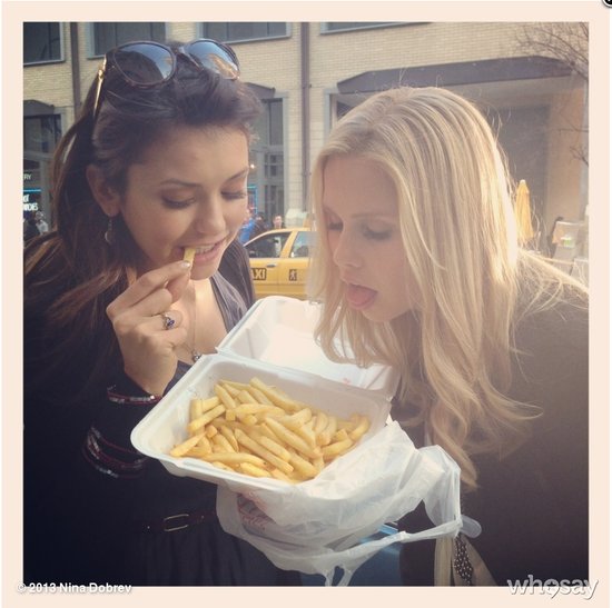 Nina Dobrev showed off a wristful of bangles while eating French fries with a friend.
Source: Nina Dobrev on WhoSay
Nina Dobrev showed off a wristful of bangles while eating French fries with a friend.
Source: Nina Dobrev on WhoSay