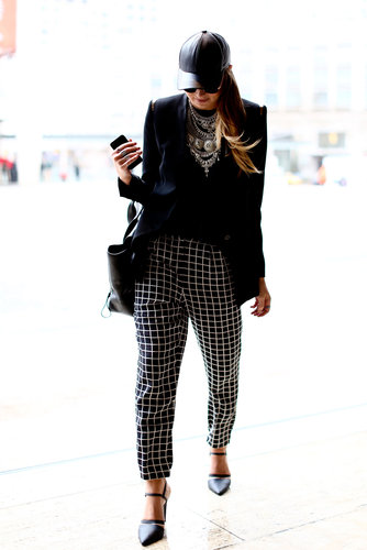 Polished patterns and posh footwear played opposites to a baseball cap.
Polished patterns and posh footwear played opposites to a baseball cap.