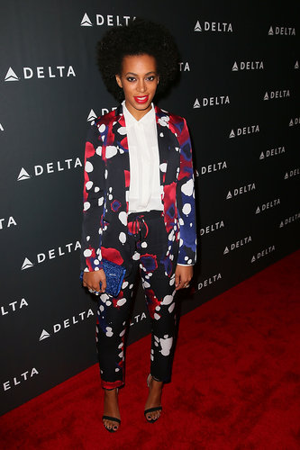 Solange Knowles struck a pose in a cropped splatter-print Diane von Furstenberg pantsuit at a pre-Grammy party in LA. Dainty ankle-strap sandals, a sequined cobalt Jimmy Choo clutch, and a few statement rings took her eye-catching ensemble to new heights.
Solange Knowles struck a pose in a cropped splatter-print Diane von Furstenberg pantsuit at a pre-Grammy party in LA. Dainty ankle-strap sandals, a sequined cobalt Jimmy Choo clutch, and a few statement rings took her eye-catching ensemble to new heights.