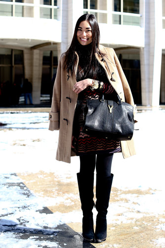 A classic act from her camel toggle coat down to her black knee-high boots.
A classic act from her camel toggle coat down to her black knee-high boots.